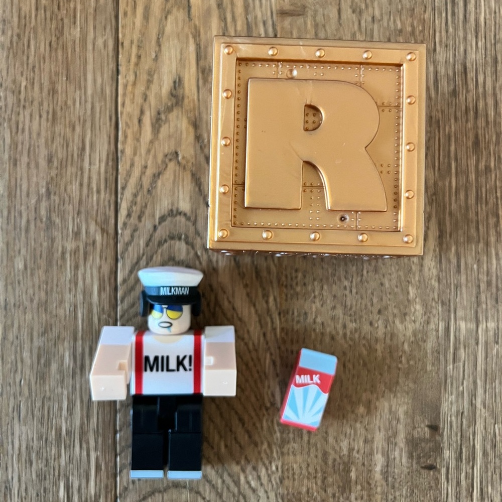 Roblox Milkman Action Figure Playset - Gold and Black